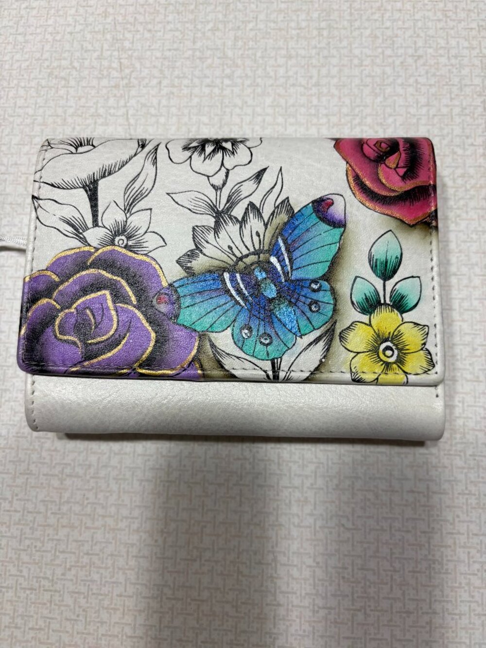 NWT Anna By Anuschka Trifold Wallet in Cream color with Red, Blue % Purple